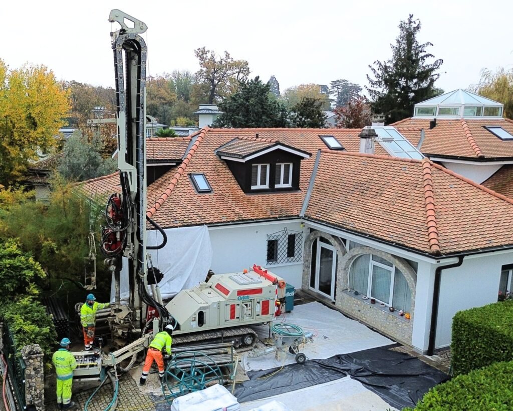Image de travaux menées par l'entreprise suisse AFM pour poser une pompe à chaleur Géothermique