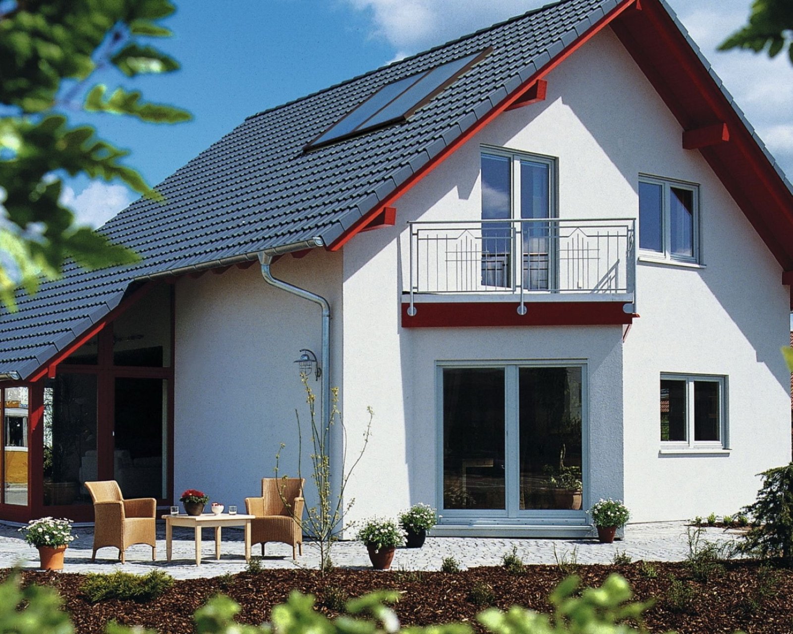 image d'une maison Suisse Romande avec un boiler solaire AFM